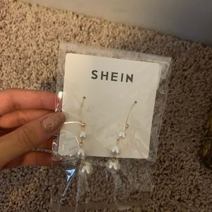 earrings and feather earrings with a bracelet